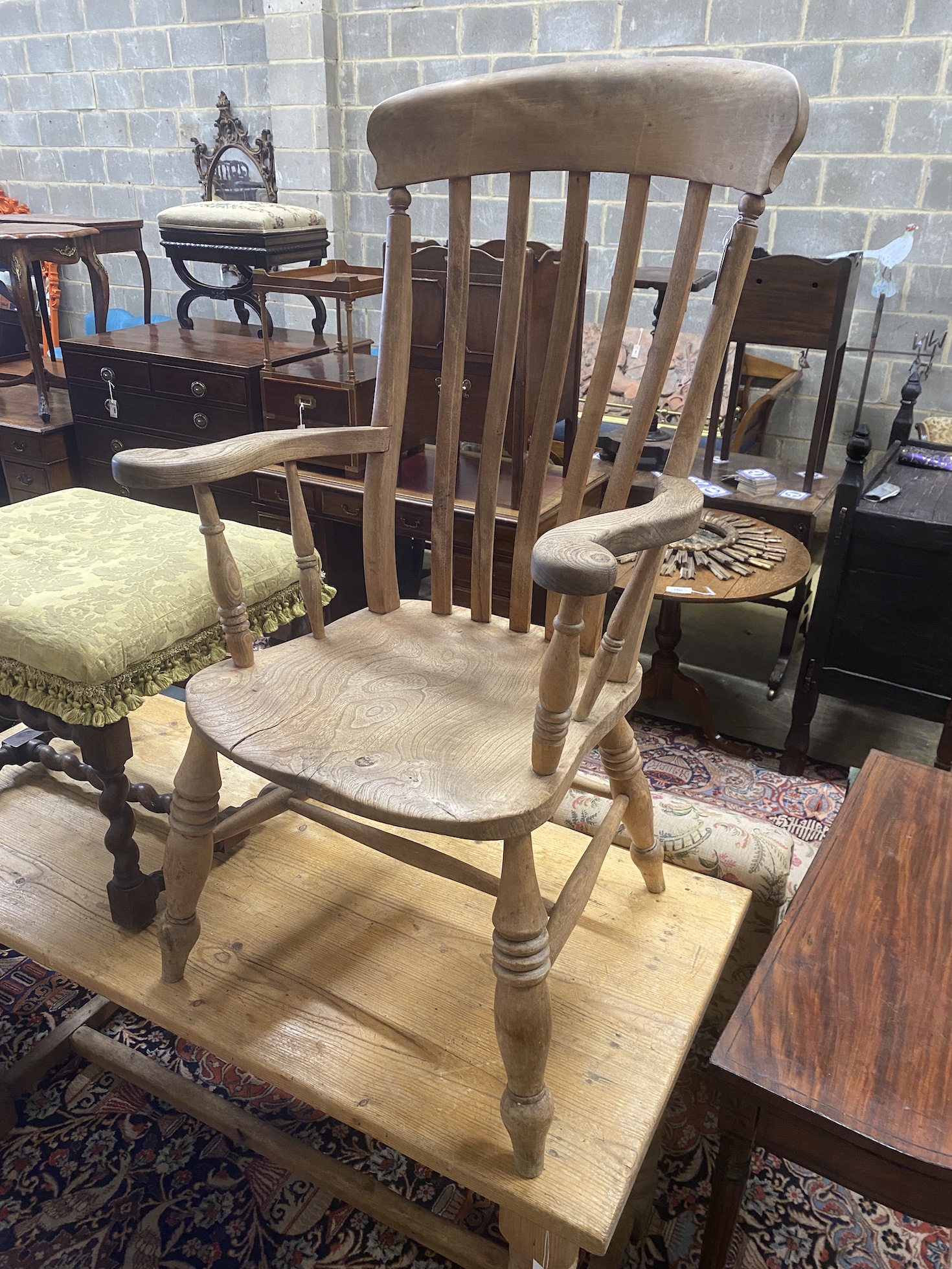 A Victorian elm and beech Windsor lathe back armchair, width 61cm, depth 49cm, height 113cm
